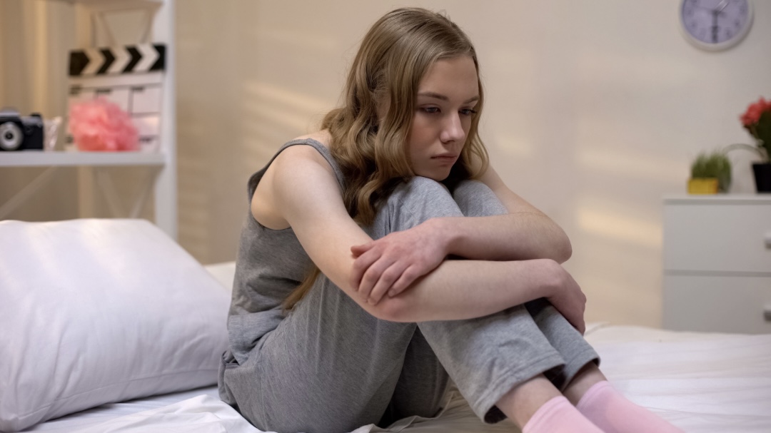 Teen Girl Struggling with self-esteem and social comparison